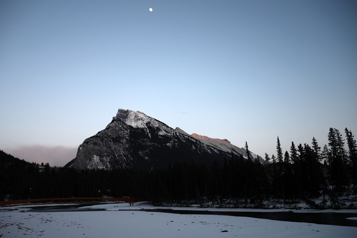 21 Moon Over Mount Rundle At Sunset From Bow River Bridge In Banff In Winter